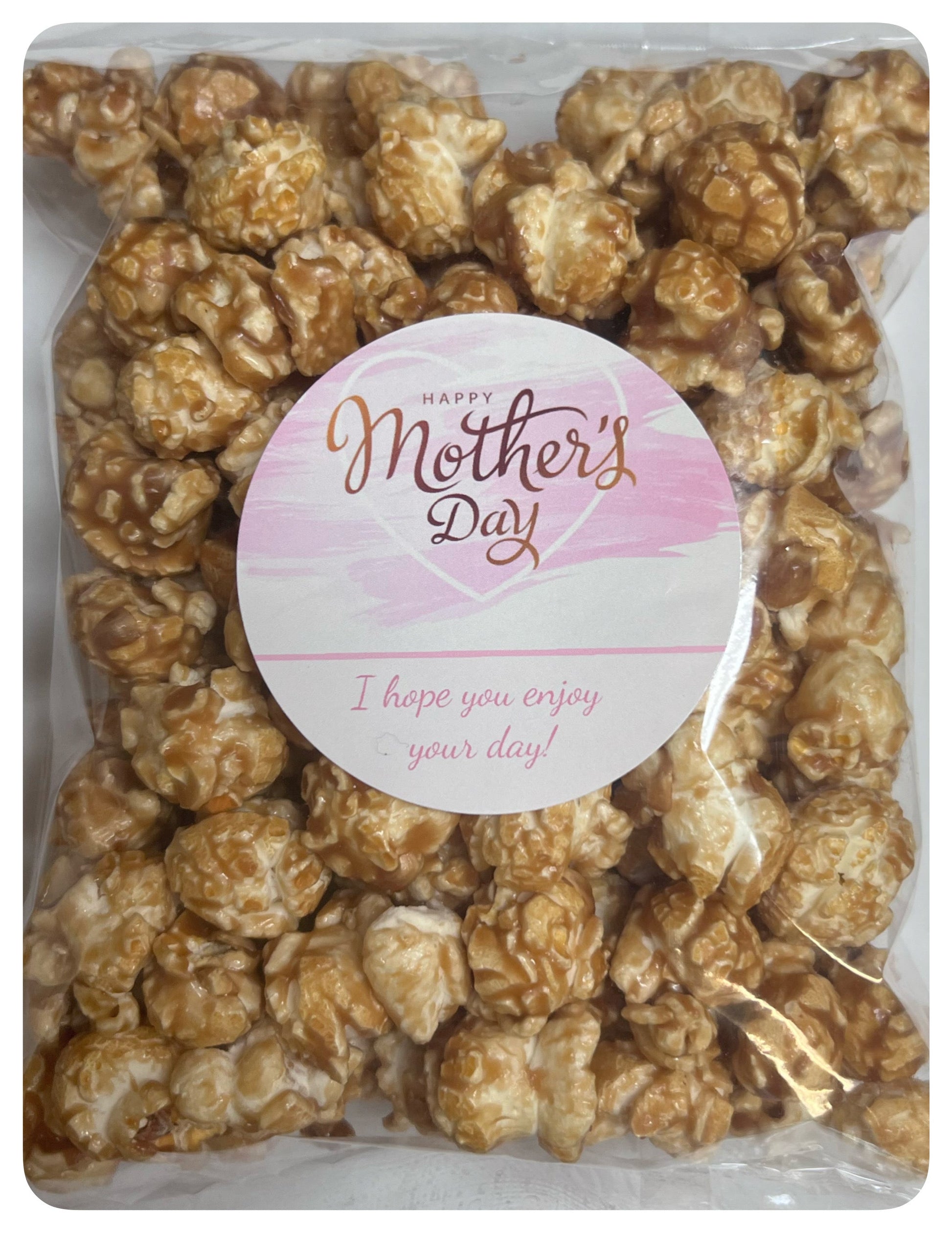 Mother's Day Snack Bag with custom logo and pink label filled with caramel popcorn.