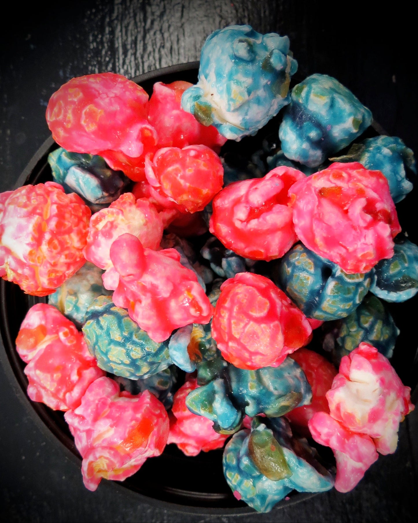 Blue and pink popcorn mix combining cotton candy and bubble gum flavors.