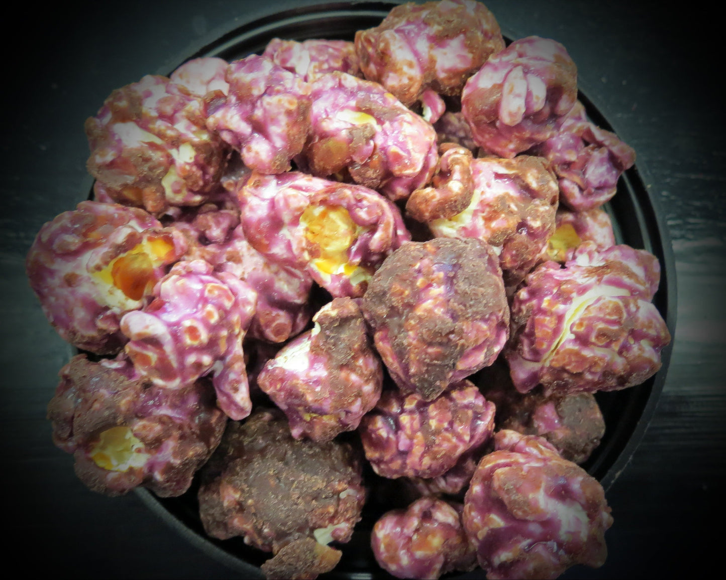 Grape Tootsie Pop flavored popcorn covered in chocolate with grape flavoring