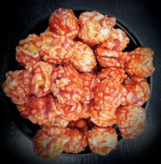 Nutty flavored popcorn with rich amaretto taste, alcohol-free.