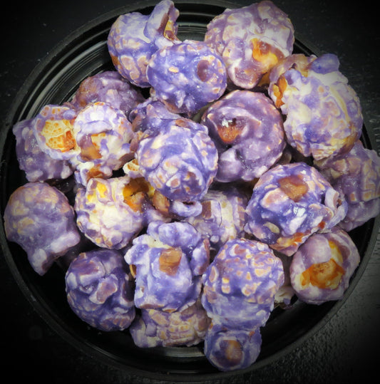 Huckleberry flavored popcorn with vibrant purple coating.
