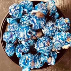Blue Hawaii flavored popcorn with tropical fruit and sweet cream coating.