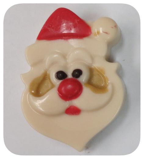 Santa-shaped chocolate covered Oreo with holiday design.