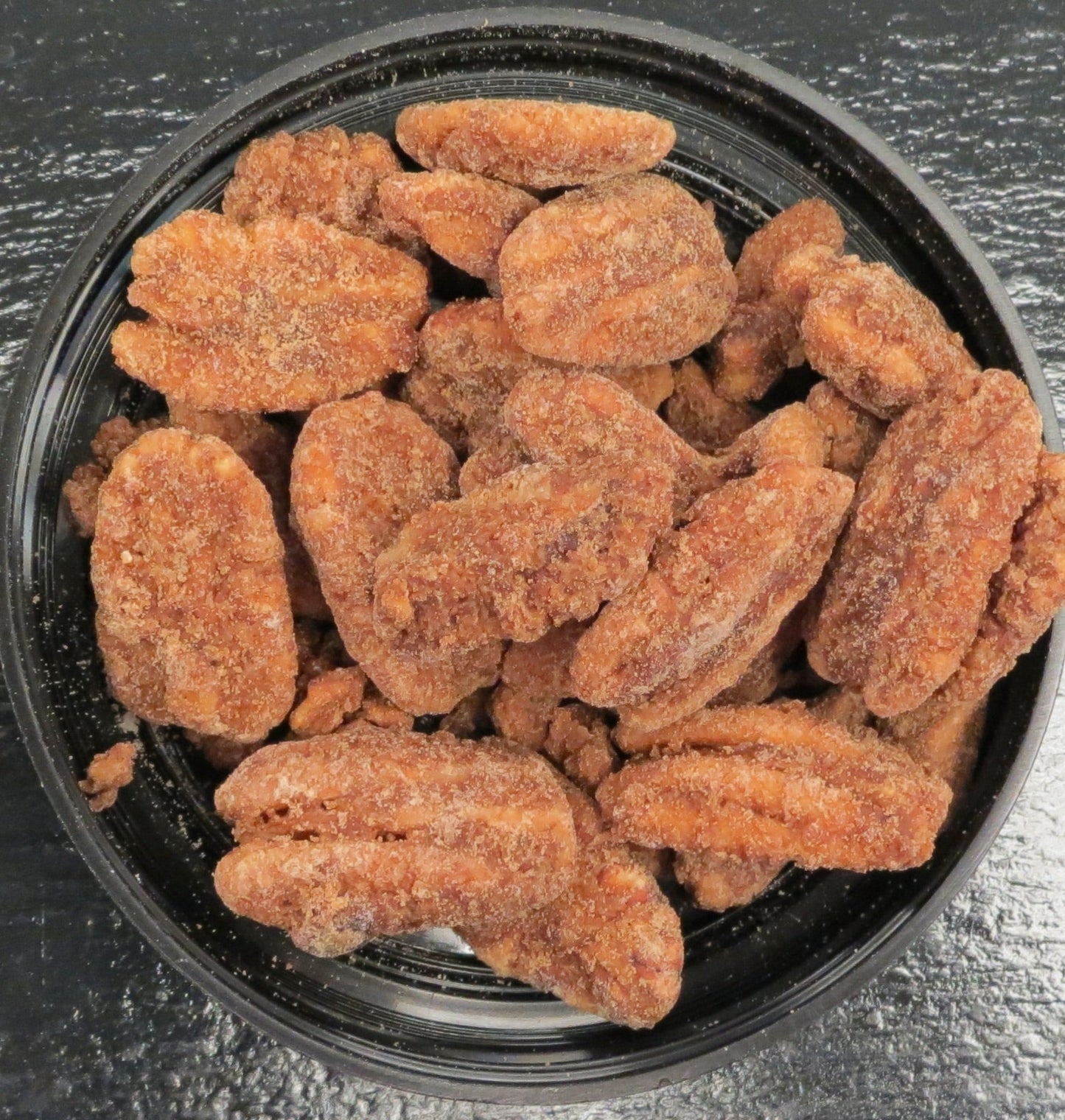 Bowl of Bourbon Praline Pecans made with real bourbon and vanilla.