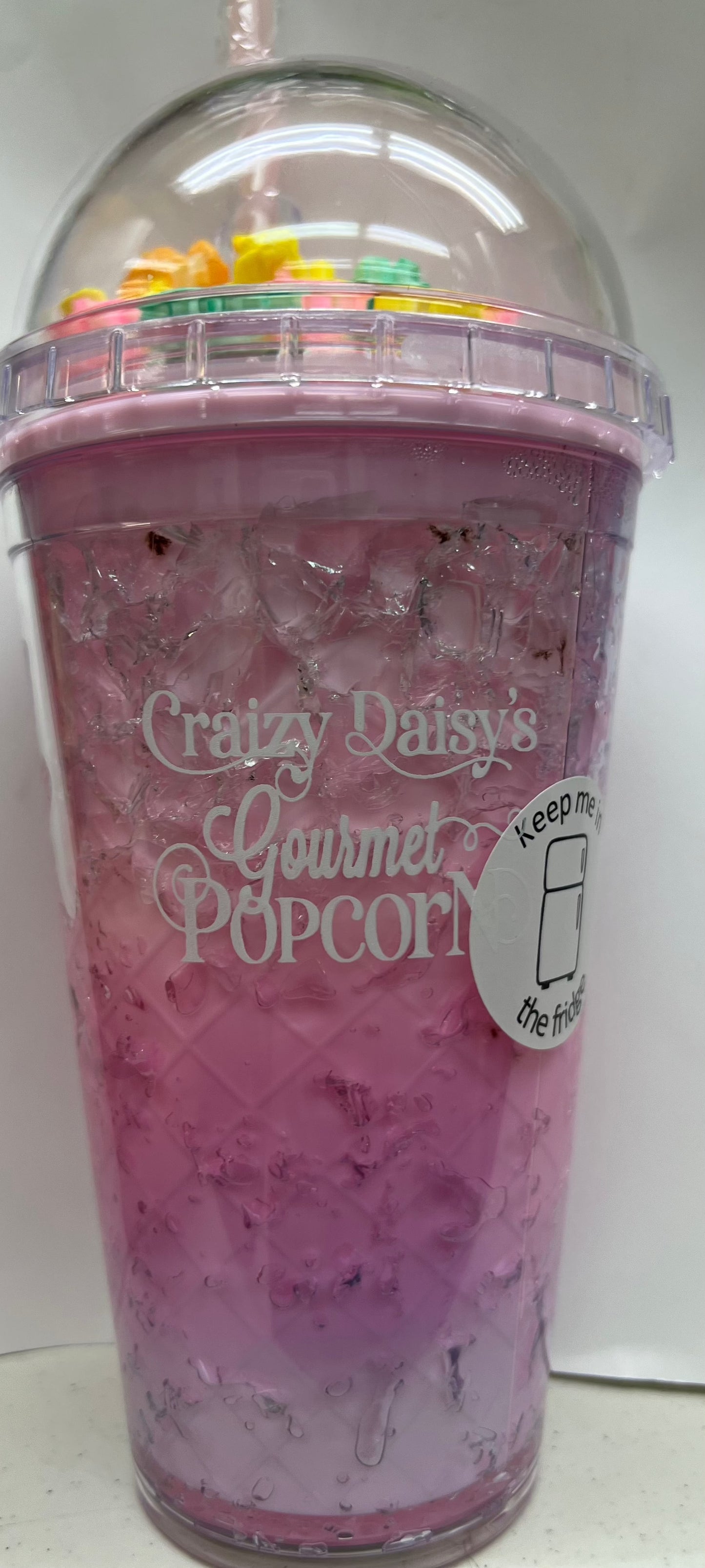 Craizy Daisy Water Bottles with ice and dome lid, purple color.