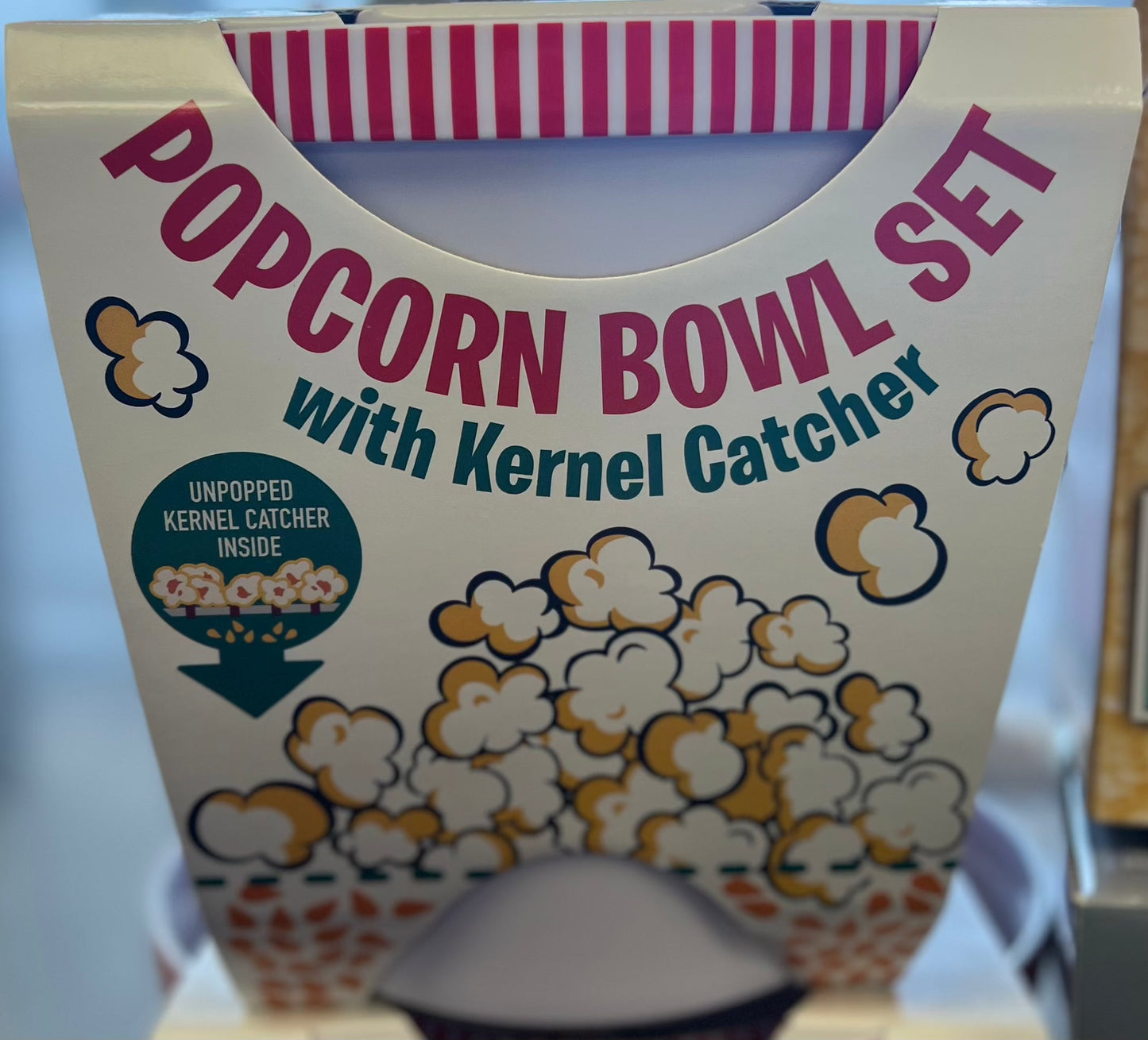 Popcorn bowl set packaging with kernel catcher feature and popcorn illustrations.