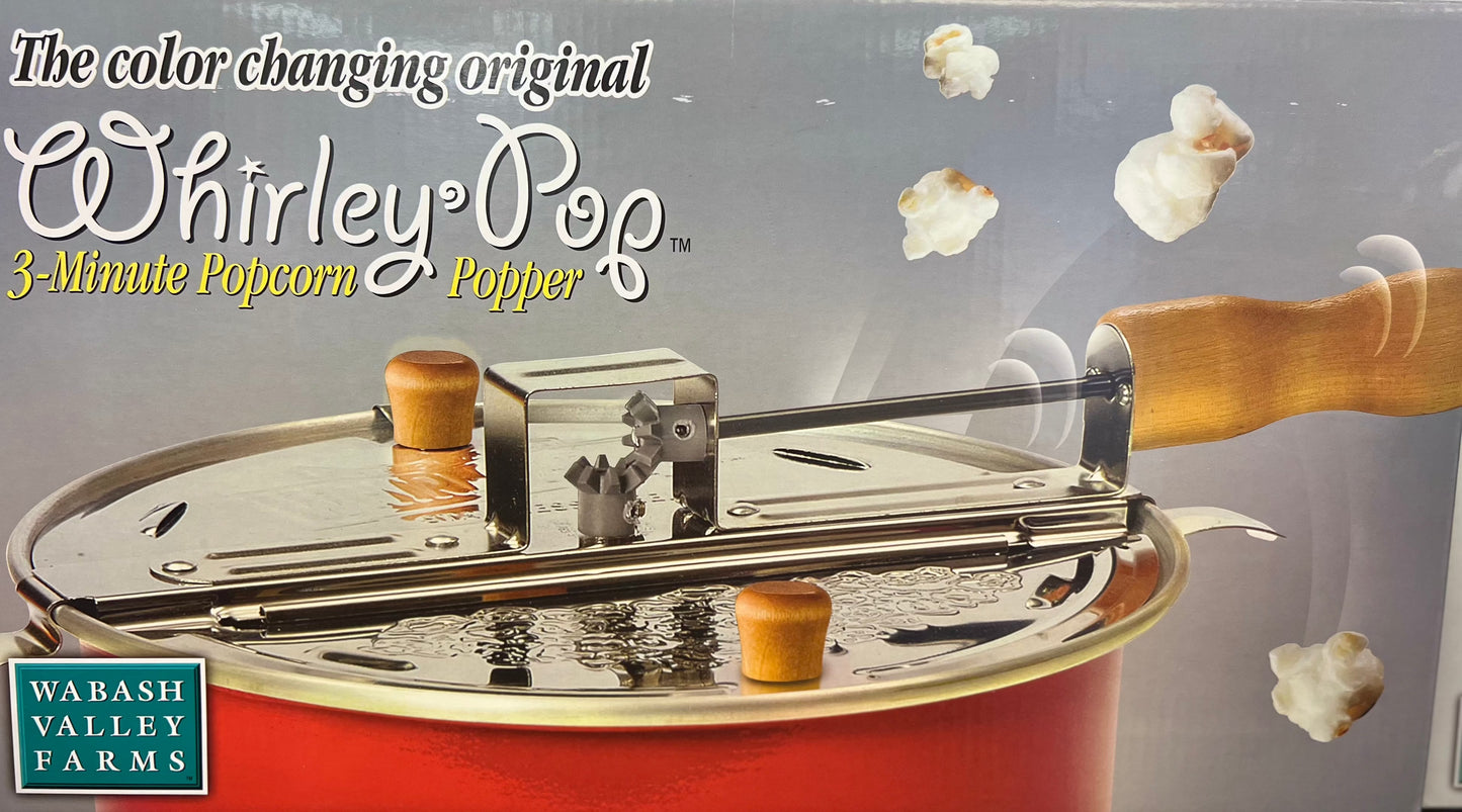 Color changing Whirley Pop popcorn popper with wooden handle.