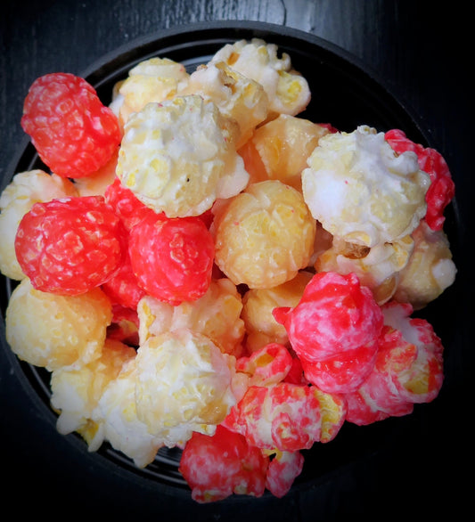 Tequila Sunrise strawberry and tequila flavored popcorn in a bowl.