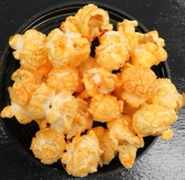 Close-up of hot buffalo flavored popcorn with seasoning visible