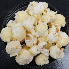 White cheddar popcorn with creamy cheese coating and ingredients list