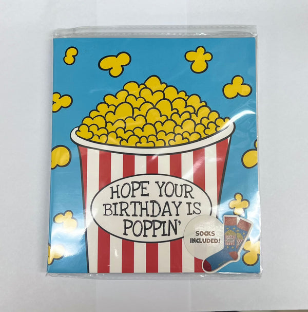 Popcorn-themed birthday card with popcorn socks included, featuring the message "Hope Your Birthday Is Poppin’".