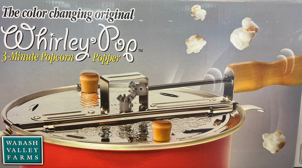 Color changing Whirley Pop popcorn popper with wooden handle.
